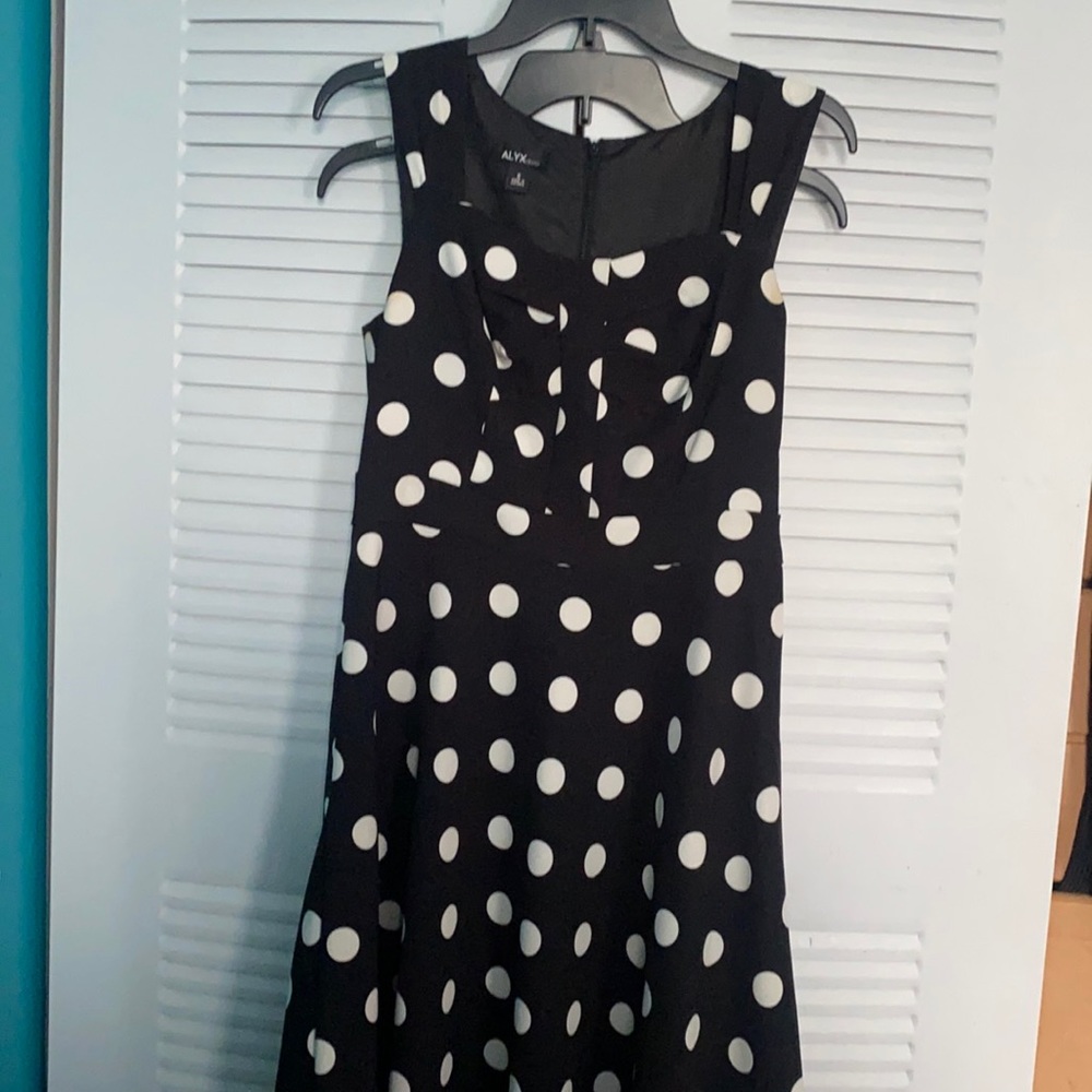 Black dress with white polka dots